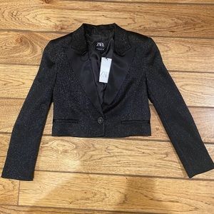 Cropped black jacket with satin lapels